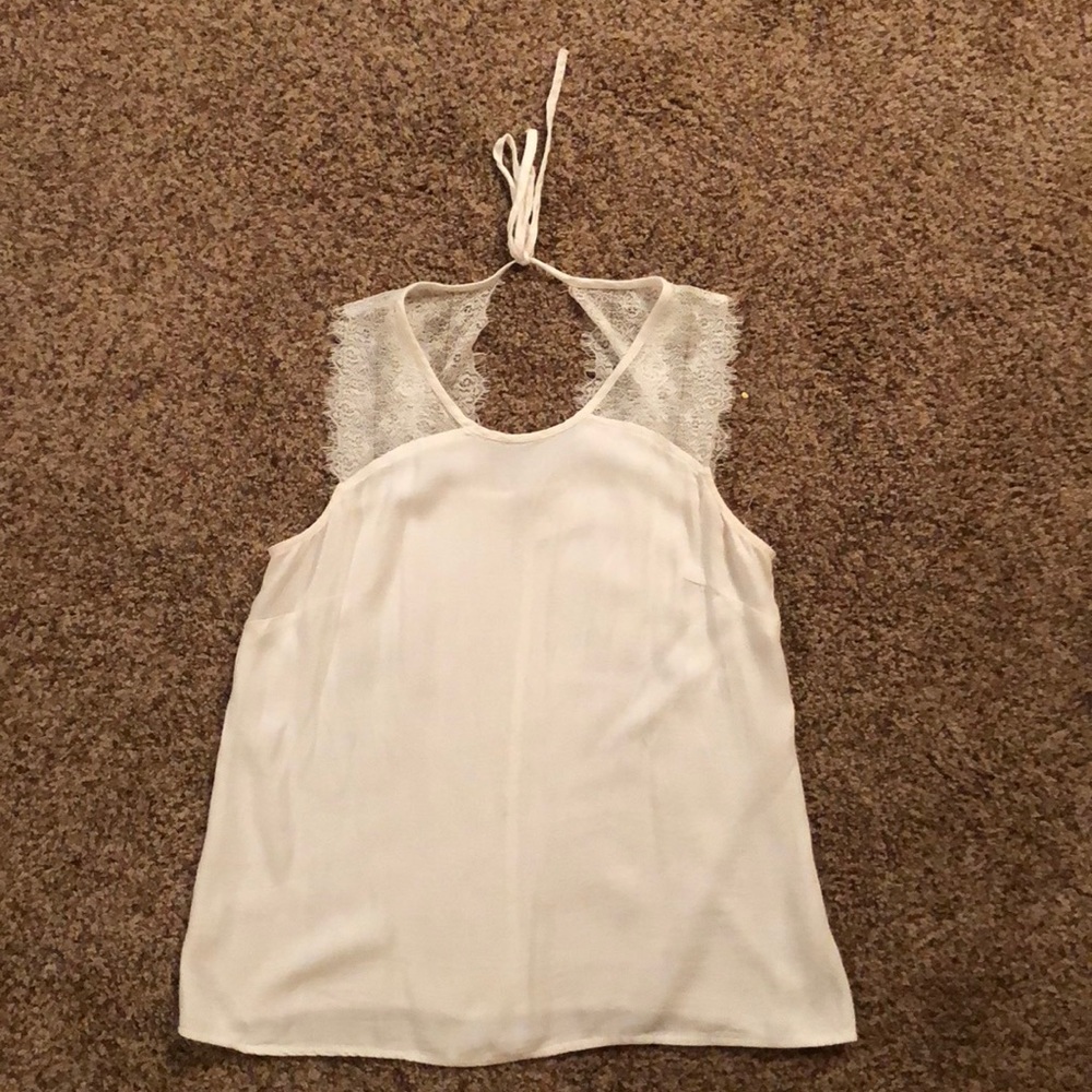 White sleeveless shirt